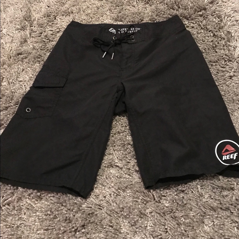 Black men’s Reef swim shorts
